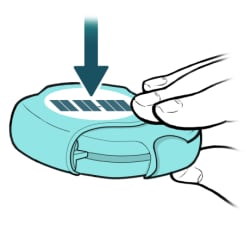 Arrow pointing to date on top of inhaler.
